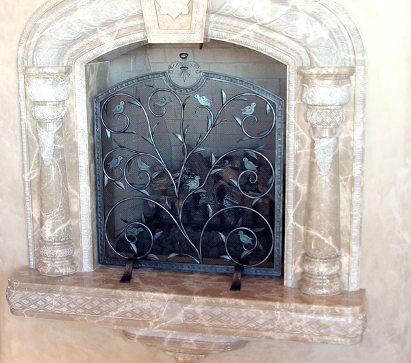 Hand-forged-fire-screen-with-bird-detail-by-Chad-Gunter.--Design-by-Morrelli