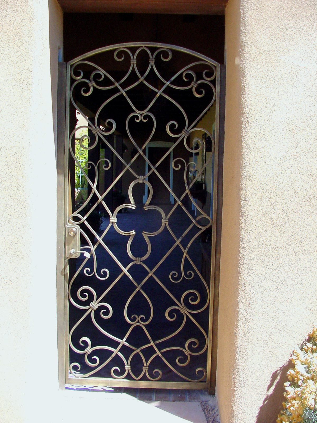Forged Iron Entry Gate with Bronze powder coat finish. Santa Fe, NM