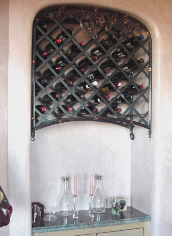 Wine Rack custom forged and fitted into the plastered nicho