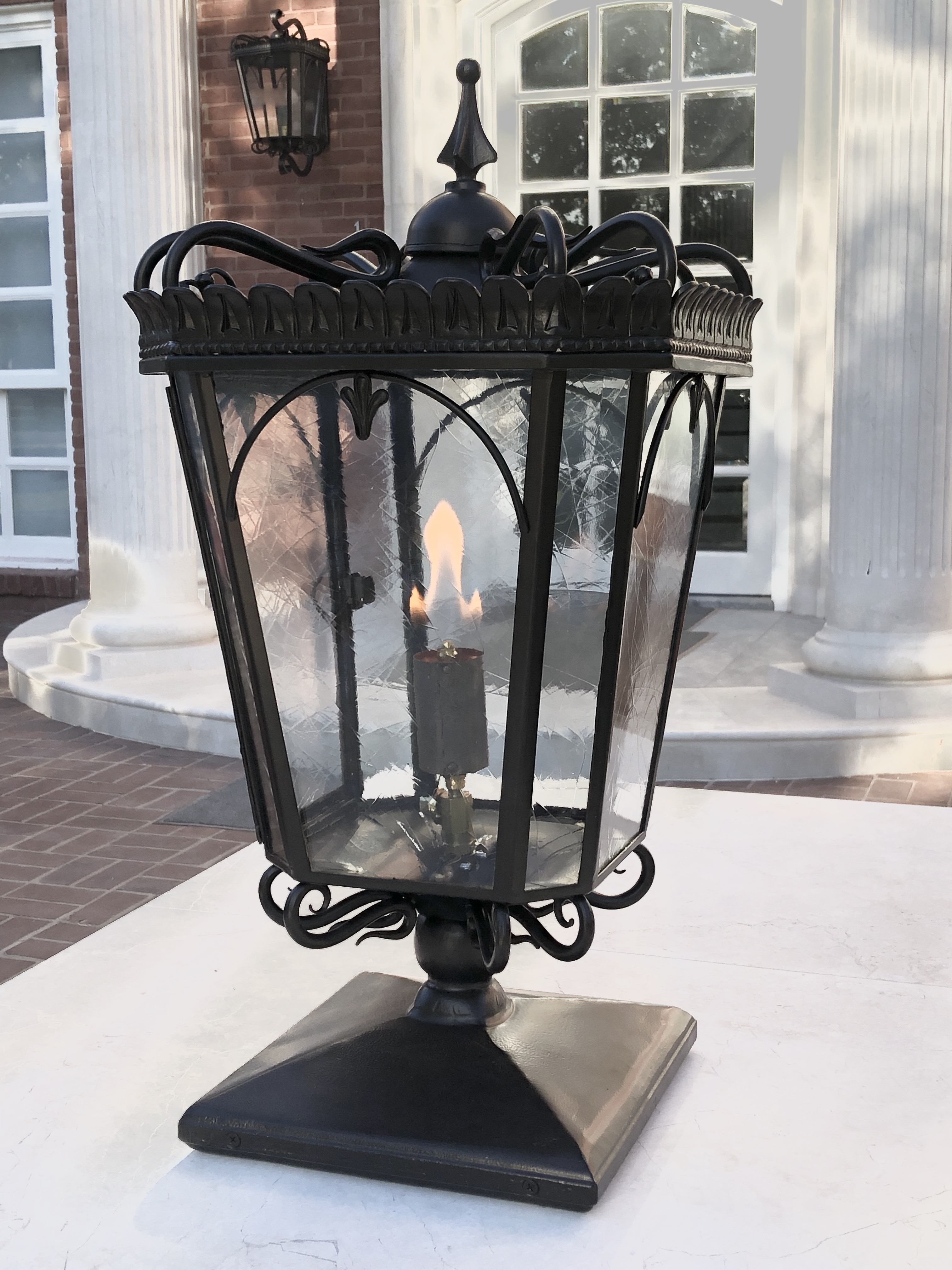 One of 2 pedestal mounted gas lamps 32” tall